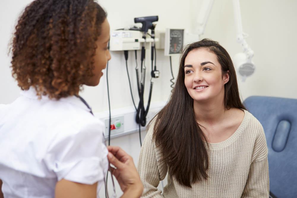 teen patient talking to gynecology provider